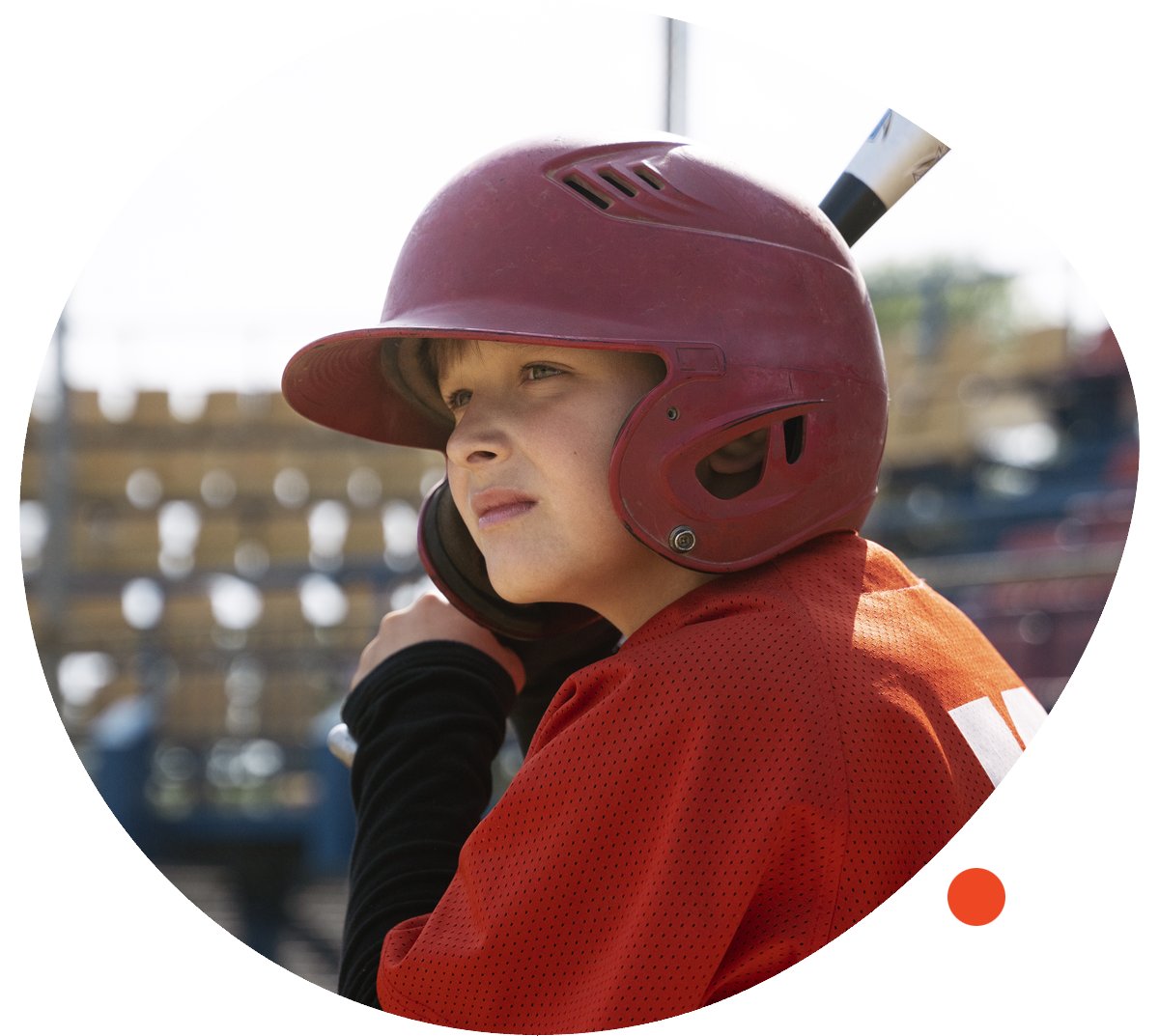 Image by Freepik. Young boy in a baseball helmet getting ready to bat.
